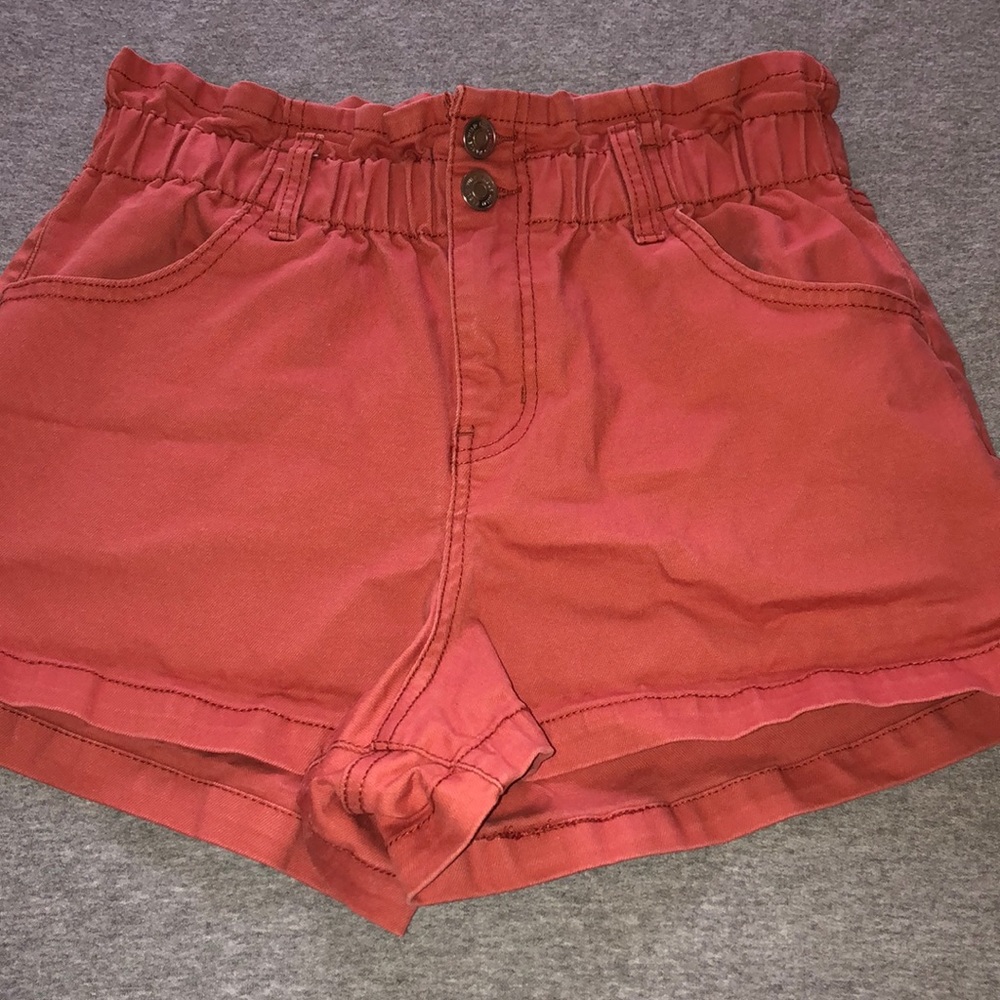 ORANGE RUFFLED BAND SHORTS.
